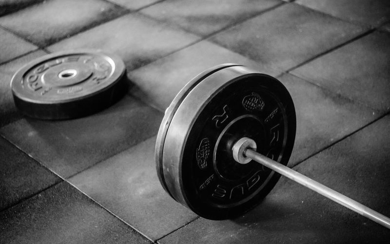 Athletic equipment on a dark gym floor