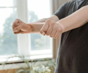 Man stretching his arms before a workout session